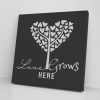 Love Grows Here Canvas Wall Art